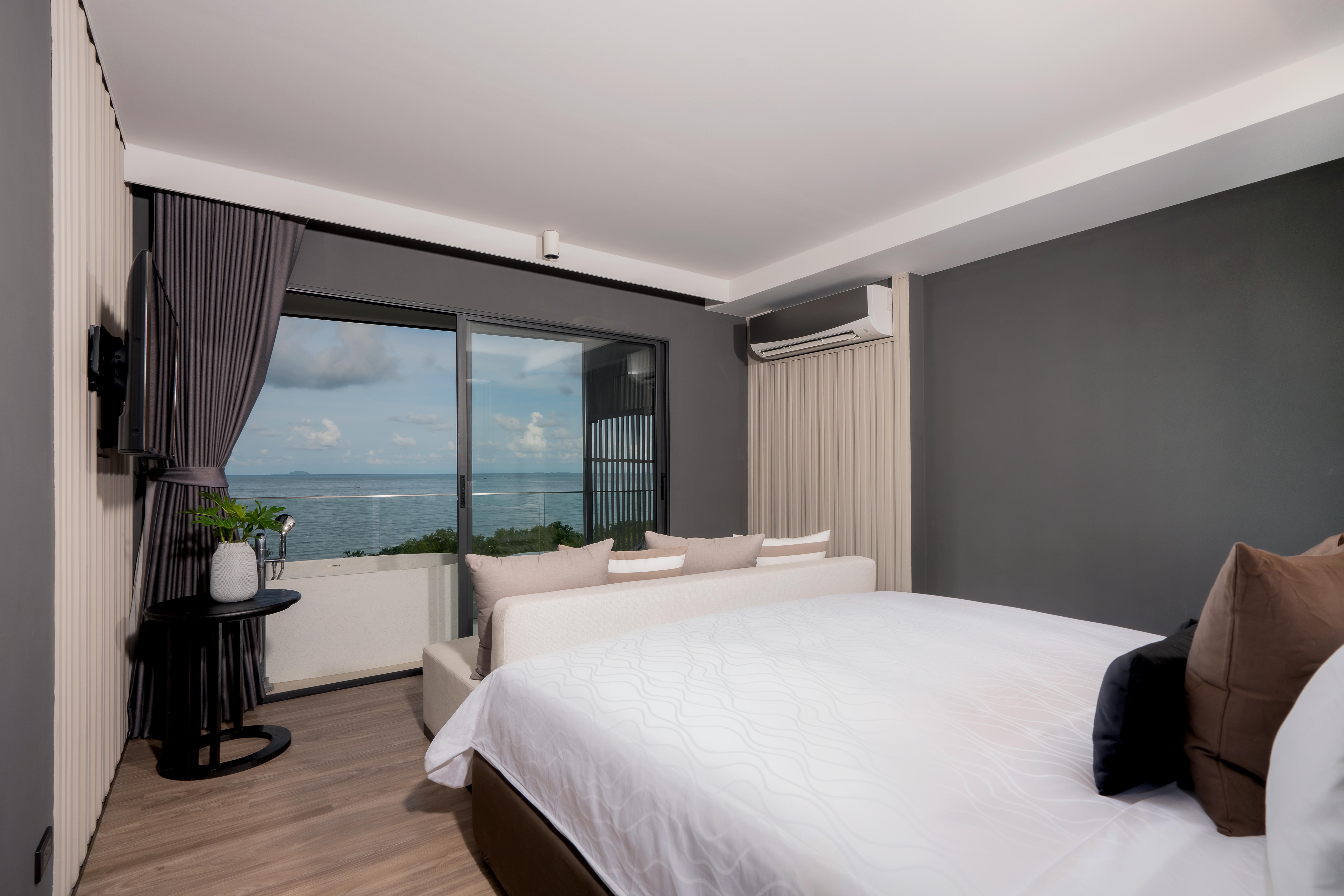 Bayphere Hotel Pattaya Jc Наджомтьєн Екстер'єр фото A bedroom in a hotel